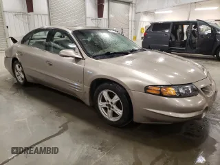 2002 Pontiac Bonneville SLE z VIN 1G2HY54K124211759, wystawiony jako Copart lot #54573555 z przebiegiem 106 409 mil mil oraz Szkoda całkowita • Salvage title. Historia ofert i sprzedaży dostępna na DreamBid. Obrazek 4.