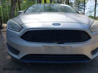 2017 Ford Focus SE with VIN 1FADP3F29HL223970, listed as a IAAI auction lot 42080613 with 104,601 mi miles. Bid and sale history available at carsss.com. Image 12.
