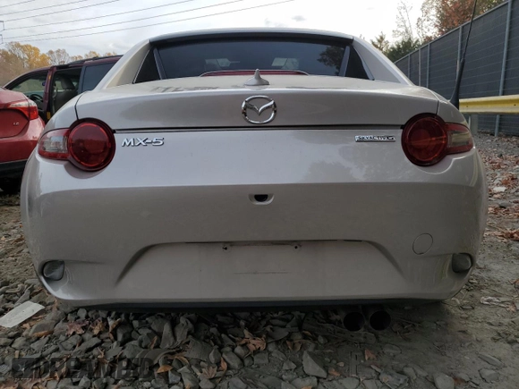 2023 Mazda MX-5 Miata Grand Touring with VIN JM1NDAM70P0552860, listed as a Copart auction lot 79240314 with 16,173 mi miles and Salvage title. Bid and sale history available at DreamBid. Image 6.