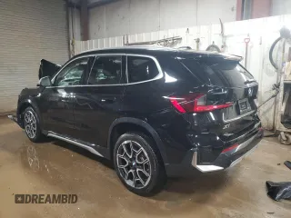 2023 BMW X1 xDrive28i with VIN WBX73EF08P5X85250, listed as a Copart auction lot 50158565 with 7,312 mi miles and Salvage Title. Bid and sale history available at DreamBid. Image 2.