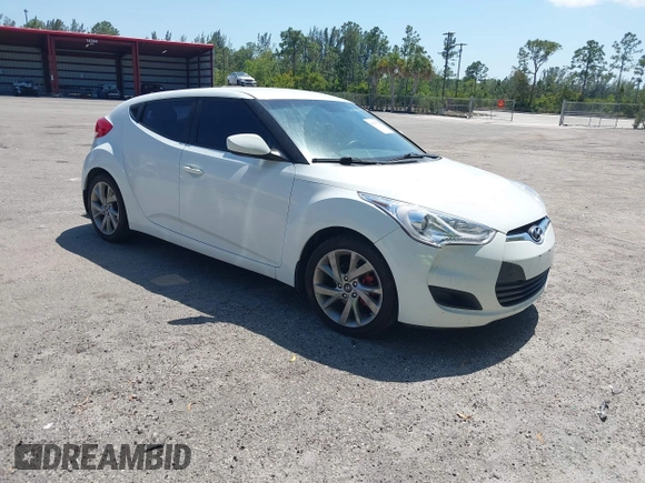 2016 Hyundai Veloster with VIN KMHTC6AD3GU270895, listed as a IAAI auction lot 42139765 with 138,884 mi miles. Bid and sale history available at carsss.com. Image 1.