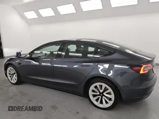 2023 Tesla Model 3 z VIN 5YJ3E1EA3PF459640, wystawiony jako Copart lot #61107195 z przebiegiem 141 027 mil mil oraz Czysty tytuł • Clean title. Historia ofert i sprzedaży dostępna na DreamBid. Obrazek 2.