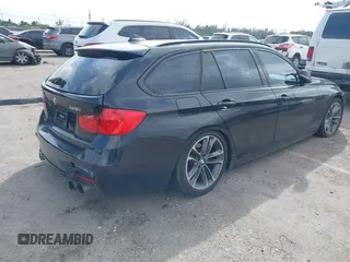 2014 BMW 3 Series 328i xDrive with VIN WBA3G7C57EKN37319, listed as a IAAI auction lot 41699235 with 93,671 mi miles and . Bid and sale history available at carsss.com. Image 4.
