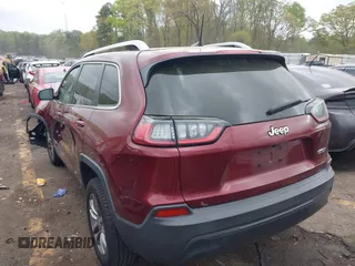 2019 Jeep Cherokee Latitude Plus with VIN 1C4PJLLB9KD434990, listed as a IAAI auction lot 41959477 with 96,283 mi miles and . Bid and sale history available at DreamBid. Image 3.