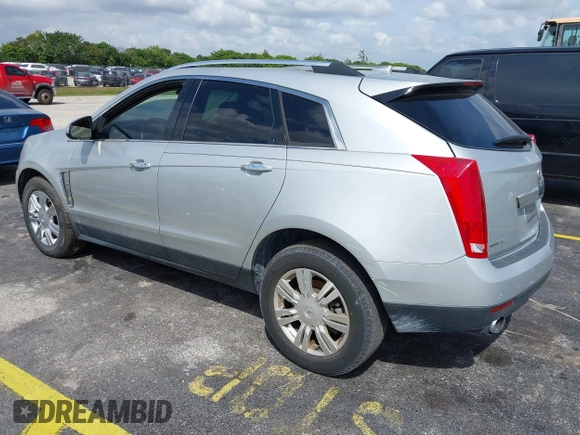 2013 Cadillac SRX Luxury Collection with VIN 3GYFNCE39DS512235, listed as a IAAI auction lot 38873243 with 133,378 mi miles and . Bid and sale history available at DreamBid. Image 3.