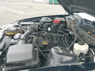 2012 Ford Mustang Premium with VIN 1ZVBP8AM7C5261635, listed as a IAAI auction lot 42981208 with 123,330 mi miles and . Bid and sale history available at DreamBid. Image 19.