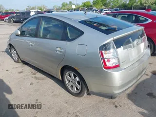 2004 Toyota Prius with VIN JTDKB20U940020058, listed as a IAAI auction lot 42142257 with 141,705 mi miles. Bid and sale history available at carsss.com. Image 3.