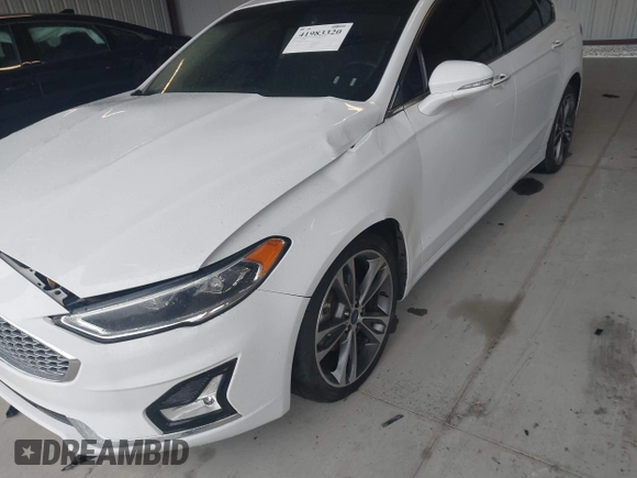 2019 Ford Fusion Titanium with VIN 3FA6P0K95KR271291, listed as a IAAI auction lot 41983320 with 71,962 mi miles and . Bid and sale history available at DreamBid. Image 20.