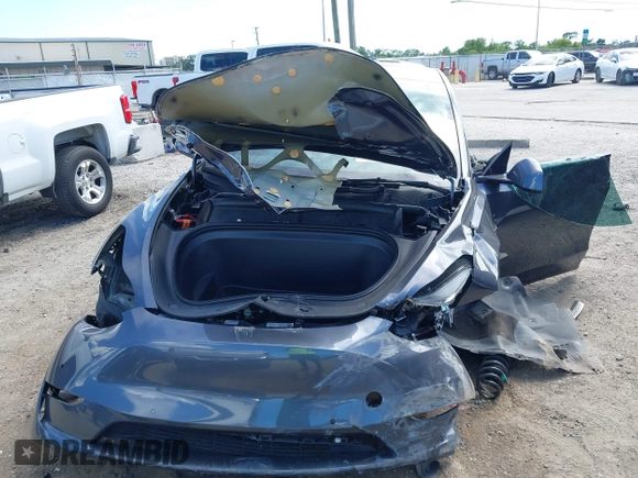 2022 Tesla Model Y Long Range z VIN 7SAYGDEE8NF443194, wystawiony jako IAAI lot #42259205 z przebiegiem 38 540 mil mil oraz . Historia ofert i sprzedaży dostępna na DreamBid. Obrazek 6.
