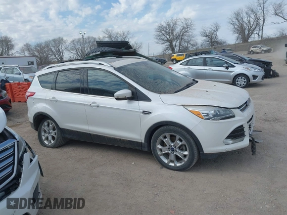 2015 Ford Escape Titanium with VIN 1FMCU9J90FUA67262, listed as a IAAI auction lot 41869583 with 161,281 mi miles. Bid and sale history available at carsss.com. Image 14.