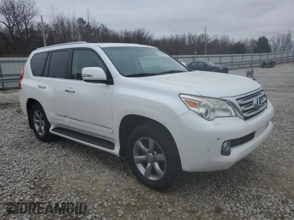 2013 Lexus GX 460 Premium z VIN JTJJM7FX7D5062605, wystawiony jako Copart lot #44064805 z przebiegiem 146 852 mil mil oraz Szkoda całkowita • Salvage title. Historia ofert i sprzedaży dostępna na DreamBid. Obrazek 4.
