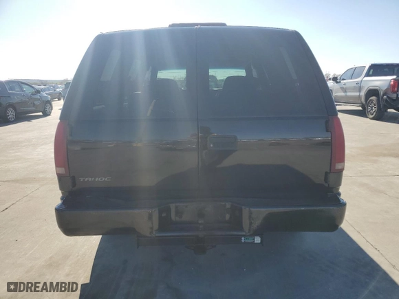 2000 Chevrolet Tahoe Limited with VIN 1GNEC13R4YR141259, listed as a Copart auction lot 85578904 with 195,944 mi miles and Salvage Title. Bid and sale history available at carsss.com. Image 6.