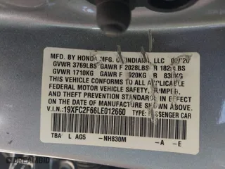 2020 Honda Civic Sedan LX with VIN 19XFC2F66LE012660, listed as a IAAI auction lot 41706100 with 63,494 mi miles. Bid and sale history available at carsss.com. Image 9.