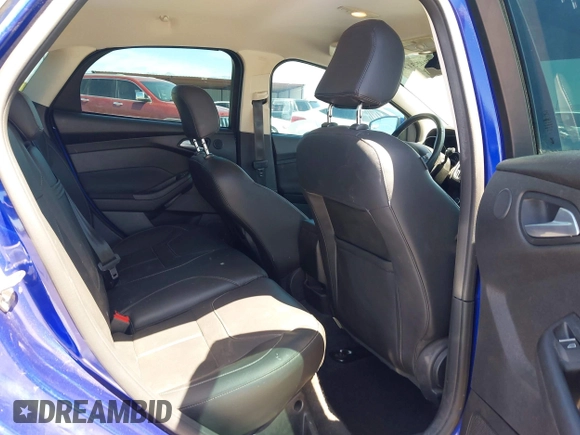 2015 Ford Focus Titanium with VIN 1FADP3J25FL314903, listed as a IAAI auction lot 42053132 with 125,418 mi miles and . Bid and sale history available at carsss.com. Image 8.