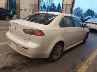 2016 Mitsubishi Lancer ES with VIN JA32U2FU7GU003157, listed as a IAAI auction lot 41279548 with 111,831 mi miles. Bid and sale history available at carsss.com. Image 4.