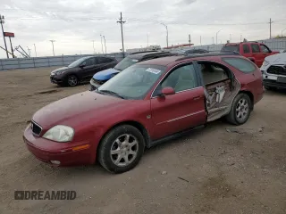 2002 Mercury Sable LS Premium z VIN 1MEFM59S52A640037, wystawiony jako Copart lot #77318134 z przebiegiem 137 836 mil mil oraz Szkody całkowita. Historia ofert i sprzedaży dostępna na DreamBid. Obrazek 1.