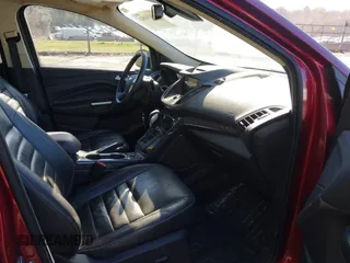 2016 Ford Escape Titanium with VIN 1FMCU0J93GUB01191, listed as a IAAI auction lot 41824183 with 97,241 mi miles. Bid and sale history available at carsss.com. Image 5.