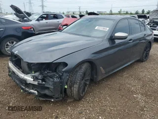 2018 BMW 5 Series M550i xDrive z VIN WBAJB9C58JB287391, wystawiony jako Copart lot #63313955 z przebiegiem 106 269 mil mil oraz Szkoda całkowita • Salvage title. Historia ofert i sprzedaży dostępna na DreamBid. Obrazek 1.
