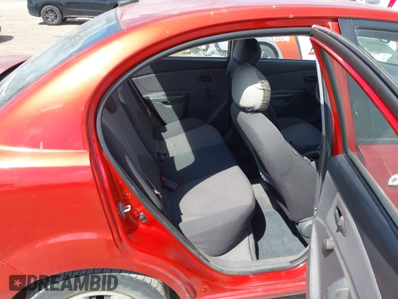 2009 Kia Rio SX with VIN KNADE223396484470, listed as a IAAI auction lot 41964027 with 167,380 mi miles. Bid and sale history available at carsss.com. Image 8.