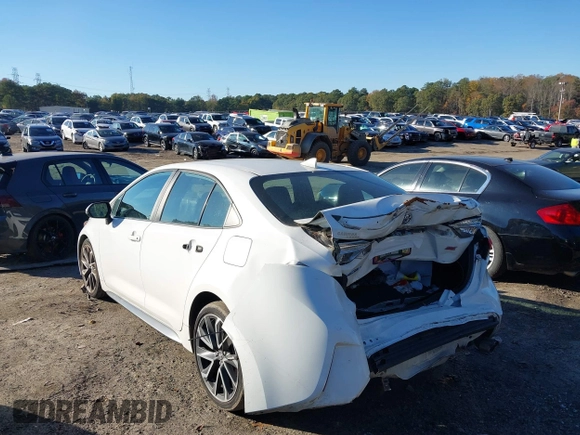 2021 Toyota Corolla SE with VIN 5YFS4MCE7MP061482, listed as a IAAI auction lot 40829549 with 137,629 mi miles. Bid and sale history available at carsss.com. Image 3.