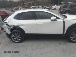 2021 Mazda CX-30 Premium with VIN 3MVDMADL5MM318729, listed as a IAAI auction lot 41645560 with 51,132 mi miles and . Bid and sale history available at DreamBid. Image 14.