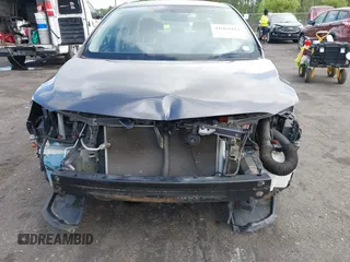 2013 Toyota Corolla L with VIN JTDBU4EE6DJ119518, listed as a IAAI auction lot 41963425 with 71,276 mi miles. Bid and sale history available at carsss.com. Image 6.