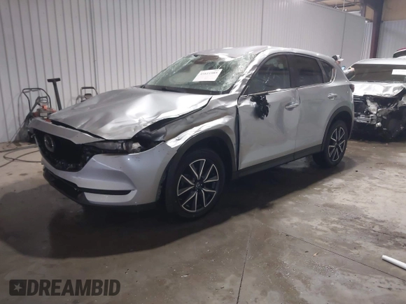 2018 Mazda CX-5 Touring with VIN JM3KFBCM7J0347769, listed as a IAAI auction lot 41611985 with 158,579 mi miles. Bid and sale history available at carsss.com. Image 18.