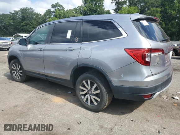 2022 Honda Pilot EX-L with VIN 5FNYF6H55NB000895, listed as a Copart auction lot 64764535 with 150,157 mi miles and Clean title. Bid and sale history available at DreamBid. Image 2.
