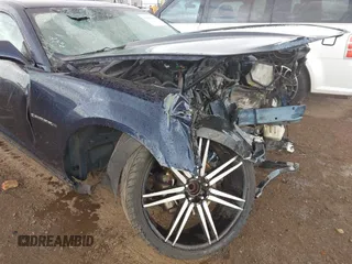 2012 Chevrolet Camaro 2LS с VIN 2G1FA1E30C9197027, выставлен на аукционе IAAI как лот 41954626 с пробегом 159 699 миль миль и . История ставок и продаж доступна на DreamBid. Изображение 18.