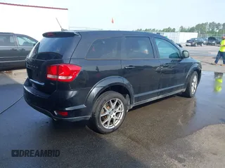 2013 Dodge Journey R/T with VIN 3C4PDCEG7DT682670, listed as a IAAI auction lot 42057985 with 221,755 mi miles and . Bid and sale history available at DreamBid. Image 4.