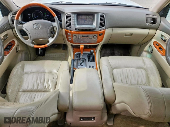 2004 Lexus LX 470 z VIN JTJHT00W743542910, wystawiony jako Copart lot #57187445 z przebiegiem 236 985 mil mil oraz Szkoda całkowita • Salvage title. Historia ofert i sprzedaży dostępna na DreamBid. Obrazek 8.