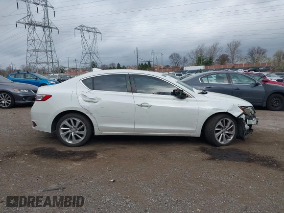 2016 Acura ILX z VIN 19UDE2F33GA013007, wystawiony jako IAAI lot #41902439 z przebiegiem 123 447 mil mil oraz . Historia ofert i sprzedaży dostępna na DreamBid. Obrazek 14.