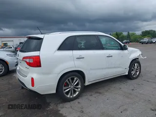2015 Kia Sorento SX Limited with VIN 5XYKWDA7XFG579348, listed as a IAAI auction lot 42542791 with 76,823 mi miles and . Bid and sale history available at DreamBid. Image 4.
