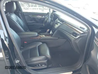 2013 Cadillac XTS Premium z VIN 2G61S5S36D9128244, wystawiony jako IAAI lot #41976485 z przebiegiem 88 033 mil mil oraz . Historia ofert i sprzedaży dostępna na DreamBid. Obrazek 5.