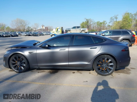 2016 Tesla Model S 90D with VIN 5YJSA1E43GF115310, listed as a IAAI auction lot 42002240 with 108,172 mi miles and . Bid and sale history available at DreamBid. Image 14.