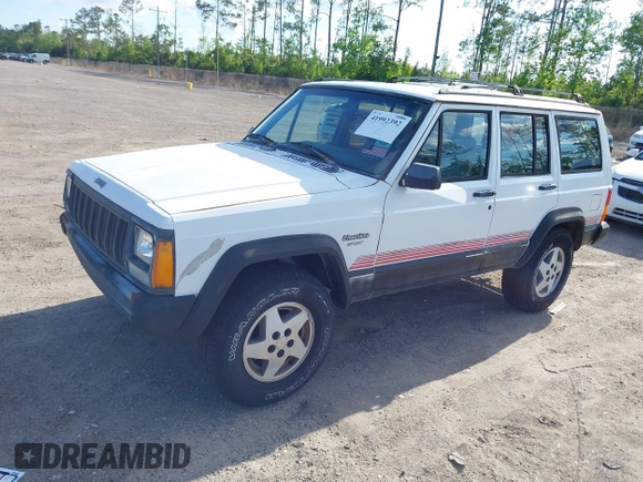 1994 Jeep Cherokee Sport with VIN 1J4FT68S7RL160652, listed as a IAAI auction lot 41992392 with 158,122 mi miles and . Bid and sale history available at DreamBid. Image 2.
