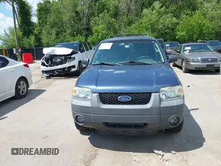 2006 Ford Escape XLT with VIN 1FMYU03156KA28848, listed as a IAAI auction lot 42670534 with 240,890 mi miles and . Bid and sale history available at DreamBid. Image 6.