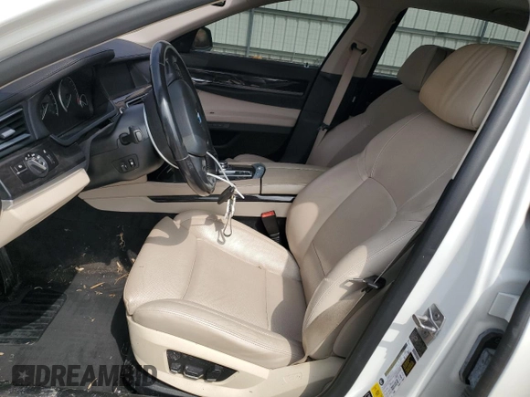 2012 BMW 7 Series 750Li xDrive with VIN WBAKC8C57CC436737, listed as a Copart auction lot 52068285 with 125,582 mi miles and Salvage Title. Bid and sale history available at carsss.com. Image 7.
