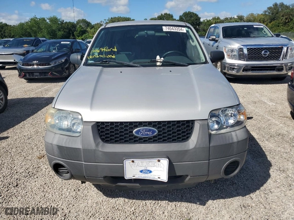 2007 Ford Escape XLS with VIN 1FMCU02Z07KB36040, listed as a Copart auction lot 74043354 with 0 mi miles and Salvage Title. Bid and sale history available at carsss.com. Image 5.