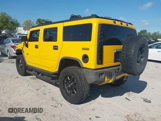 2003 Hummer H2 with VIN 5GRGN23U93H108017, listed as a IAAI auction lot 41793034 with 203,739 mi miles. Bid and sale history available at carsss.com. Image 3.