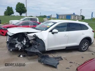 2018 Mazda CX-9 Touring с VIN JM3TCACY0J0214717, выставлен на аукционе IAAI как лот 42331827 с пробегом 116 470 миль миль и . История ставок и продаж доступна на DreamBid. Изображение 15.