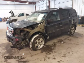 2009 Honda Pilot EX-L with VIN 5FNYF48579B044150, listed as a IAAI auction lot 41568792 with 244,763 mi miles. Bid and sale history available at carsss.com. Image 2.