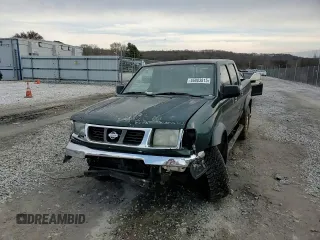 2000 Nissan Frontier XE z VIN 1N6ED27Y0YC324008, wystawiony jako Copart lot #46883815 z przebiegiem 193 512 mil mil oraz Szkoda całkowita • Salvage title. Historia ofert i sprzedaży dostępna na DreamBid. Obrazek 11.