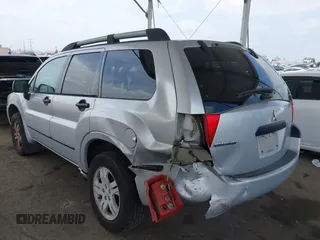 2005 Mitsubishi Endeavor LS z VIN 4A4MM21S25E049088, wystawiony jako IAAI lot #42228783 z przebiegiem 243 731 mil mil oraz . Historia ofert i sprzedaży dostępna na DreamBid. Obrazek 3.