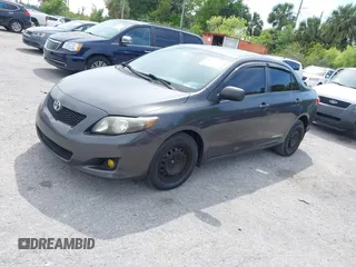 2010 Toyota Corolla with VIN 1NXBU4EE7AZ237289, listed as a IAAI auction lot 41877935 with 198,861 mi miles. Bid and sale history available at carsss.com. Image 16.