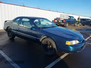 1996 Ford Thunderbird LX with VIN 1FALP62W1TH100925, listed as a IAAI auction lot 41289811 with 84,056 mi miles and . Bid and sale history available at DreamBid. Image 1.