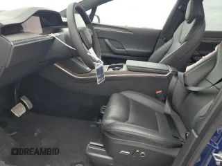 2023 Tesla Model X with VIN 7SAXCDE51PF415778, listed as a Copart auction lot 51792205 with Not Provided miles and Salvage Title. Bid and sale history available at DreamBid. Image 7.