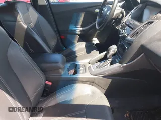 2013 Ford Focus Titanium with VIN 1FADP3J22DL106166, listed as a IAAI auction lot 42233351 with 108,300 mi miles and . Bid and sale history available at carsss.com. Image 5.