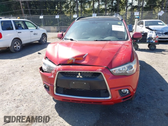 2011 Mitsubishi Outlander Sport SE with VIN JA4AP4AU3BZ022916, listed as a IAAI auction lot 42036738 with 145,070 mi miles. Bid and sale history available at carsss.com. Image 12.