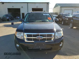2008 Ford Escape XLT with VIN 1FMCU93168KD23345, listed as a Copart auction lot 77482674 with 142,607 mi miles and Clean title. Bid and sale history available at DreamBid. Image 5.